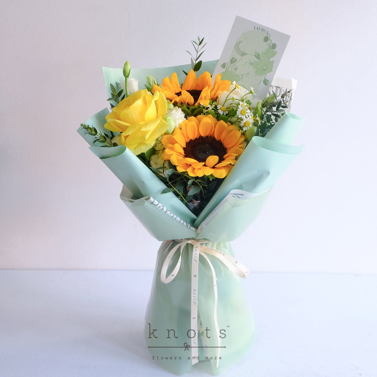 Idona Taurus (Sunflower and Yellow Rose Bouquet)