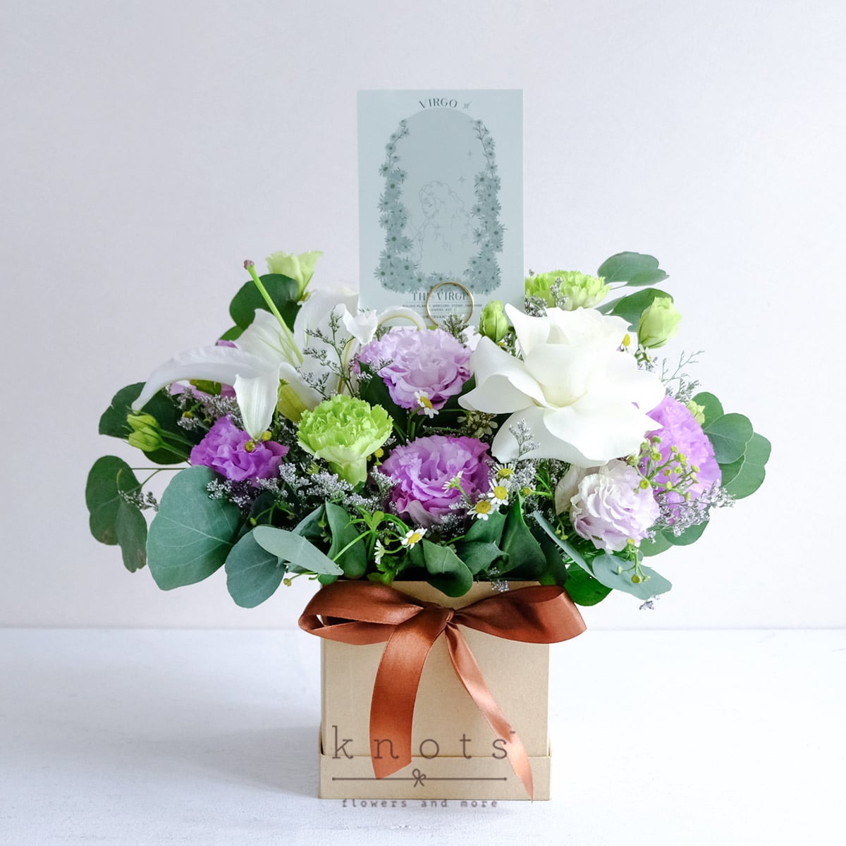 Cosmic Virgo (White Lily, White Rose, and Green Carnation Arrangement)