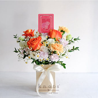 The Fearless Ram (Orange Roses Arrangement)