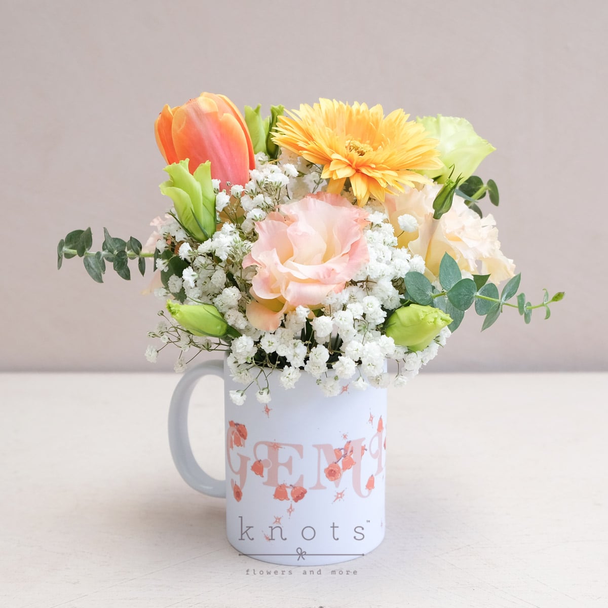 Charming Gemini (Tulip and Gerbera Cup Arrangement)