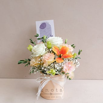 Austen Sagittarius (White Roses, and Orange Tulip Boxed Arrangement)