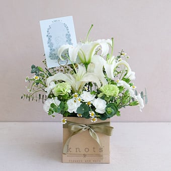 Vita Virgo (White Lilies, and Carnations Arrangement)