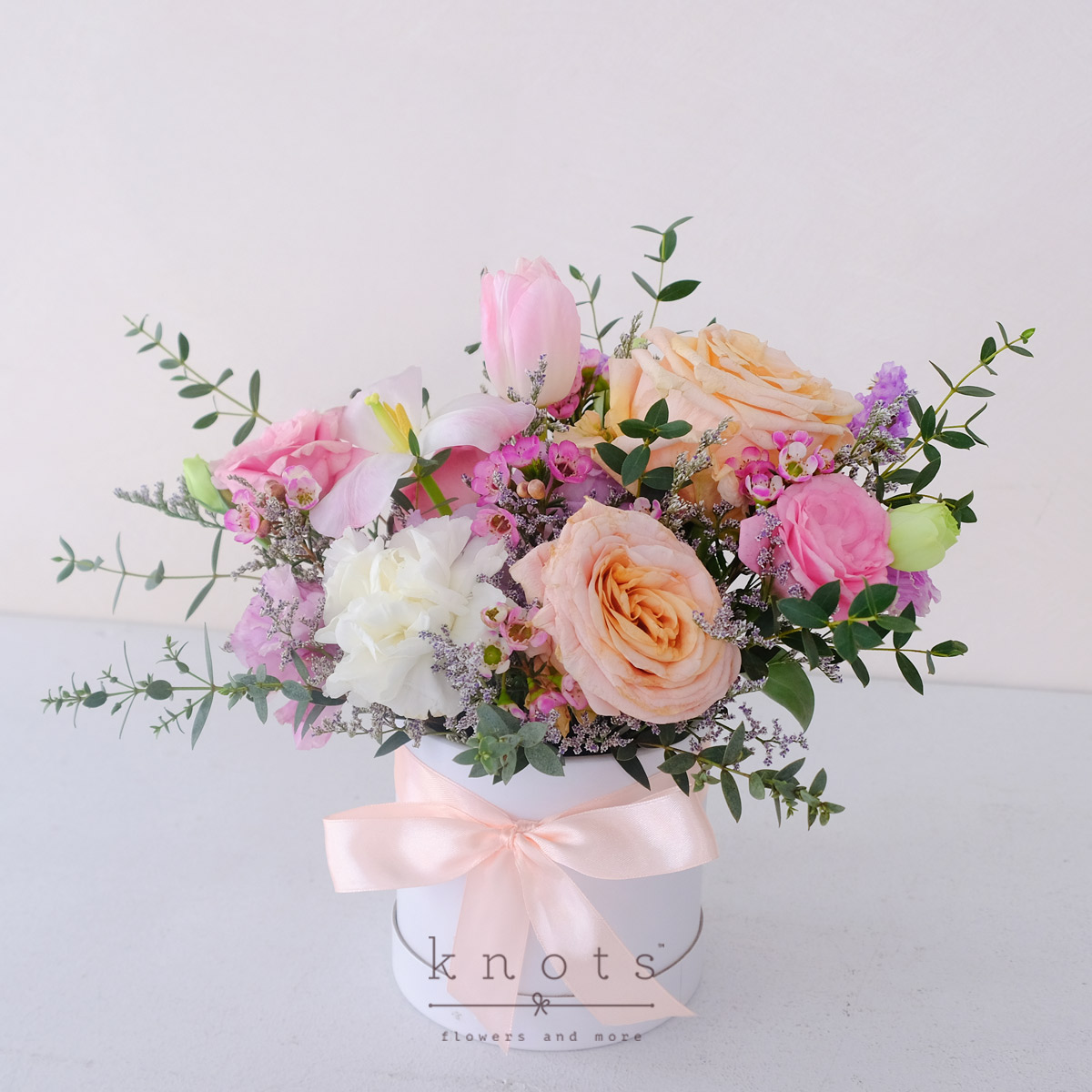 BX2510A-Youthful-Garden-Pink-Tulips-and-Peach-Ecuadorian-Rose-Arrangement_1200