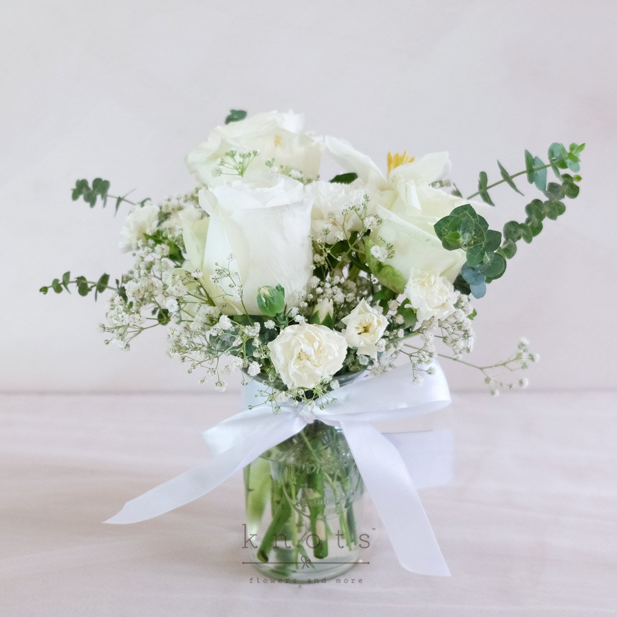 Loving Tributes (White Ecuadorian Roses & Tulips Arrangement)