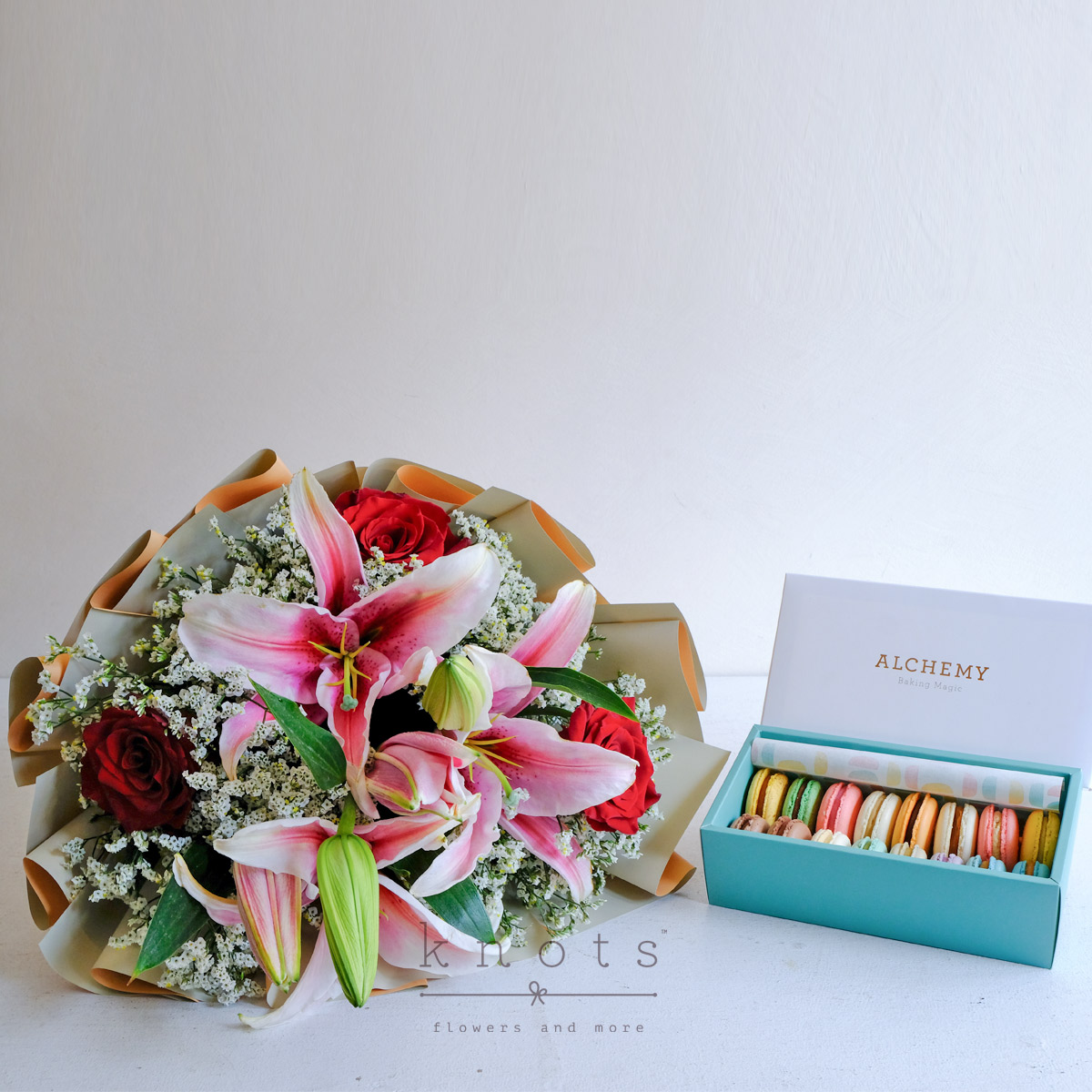 Stargazer Sweets (Pink Lily and Red Ecuadorian Roses Bouquet with Macarons)