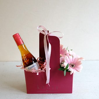 Rosy Cheers (Pink Gerbera Arrangement with Wine)