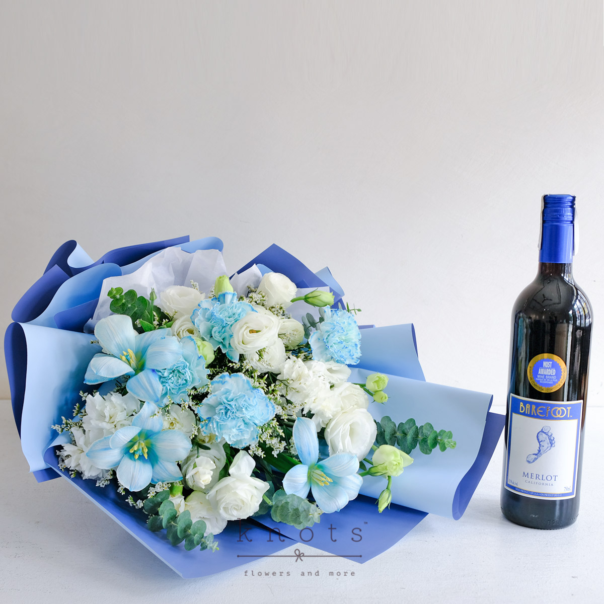 The Sapphire Soiree (Ice Blue Dyed White Tulips Bouquet with Wine)