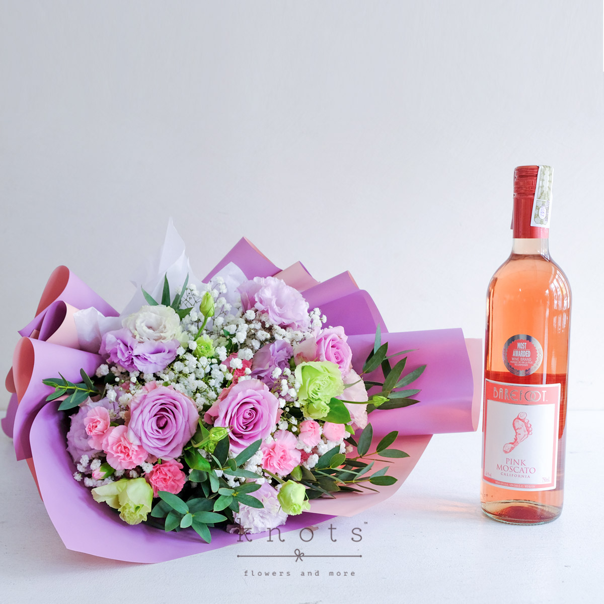 Elegance in Rosé (Purple Roses Bouquet with Wine)