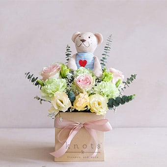Lovely Innocence (Flower Arrangement and Cuddly)