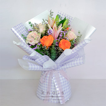 Twilight Charm (Pink Lily and Ecuadorian Roses Bouquet)