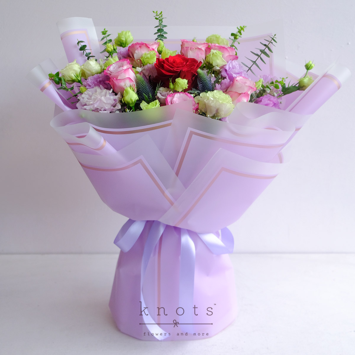 Kiss of Life (Red Ecuadorian Rose and Purple Roses Bouquet)