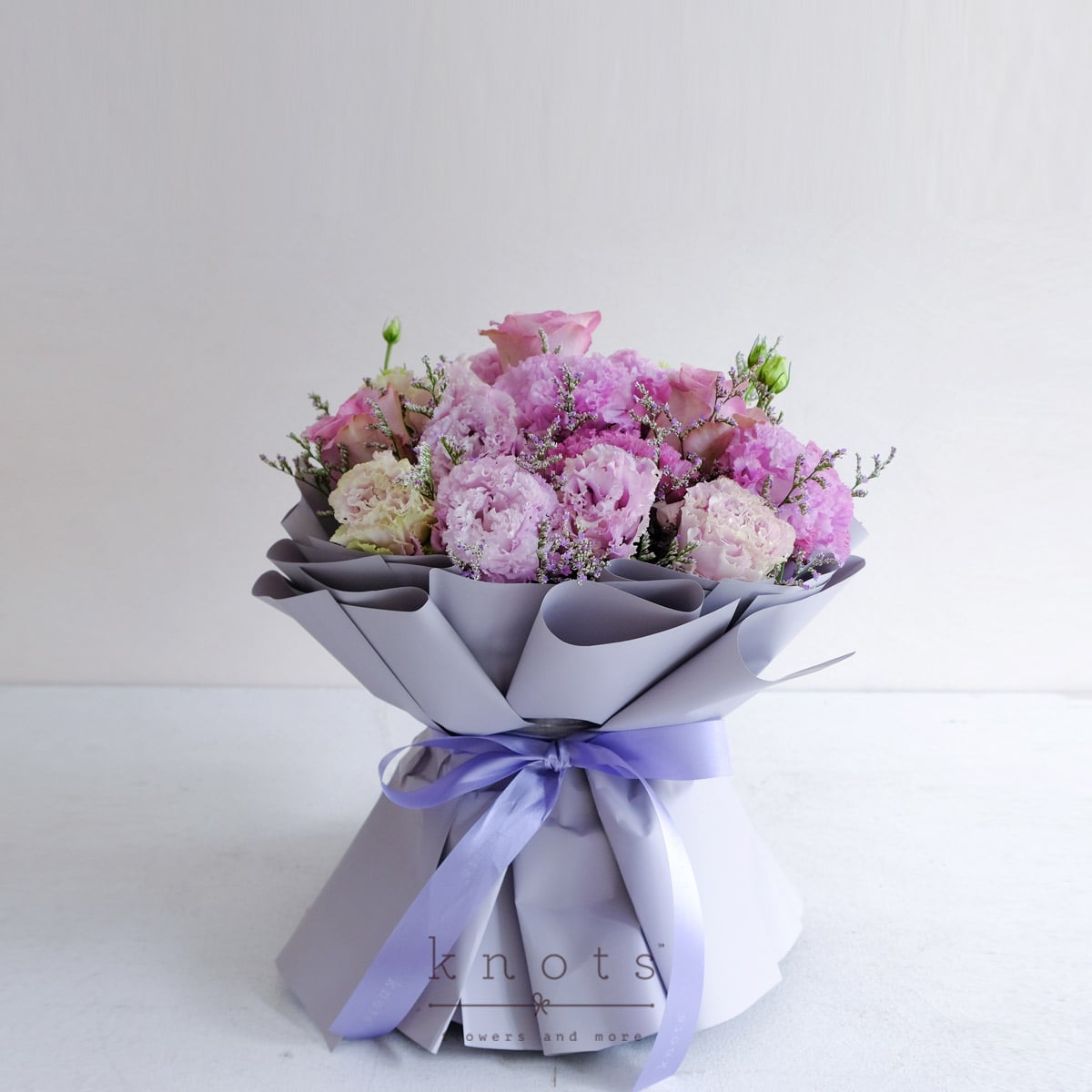 Raspberry Darling (Lilac Roses Arrangement)