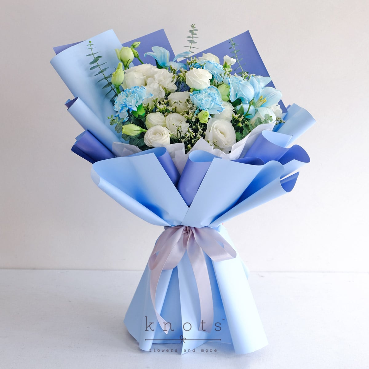 Celeste (Ice Blue Dyed White Tulips and White Carnation Bouquet)