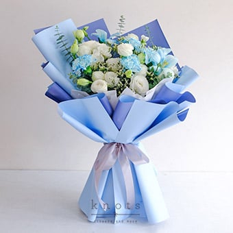 Celeste (Ice Blue Dyed White Tulips and White Carnation Bouquet)