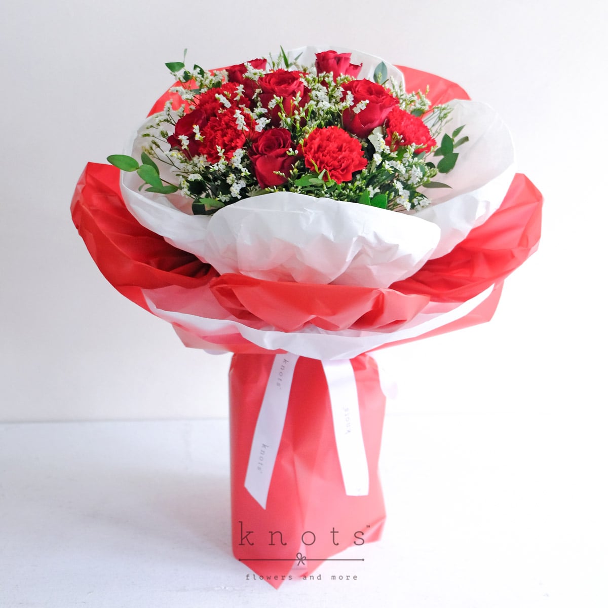 Lover's Surprise (Red Rose and Red Carnation Bouquet)