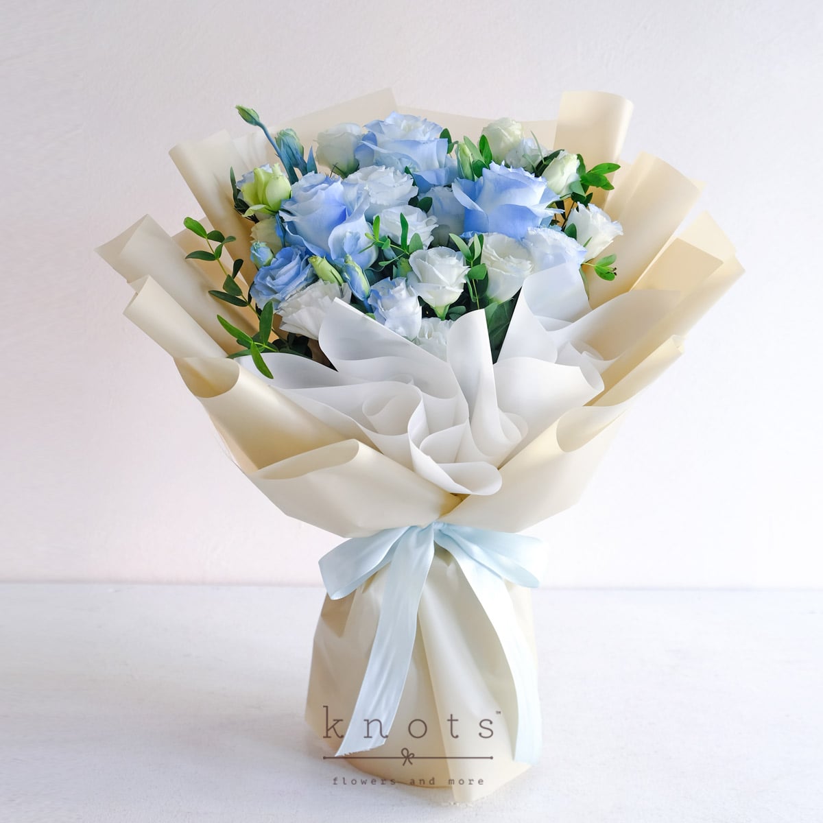 Kristia (Light Blue Sprayed White Roses Bouquet)