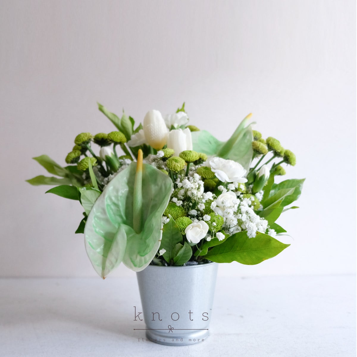 Verdant Grace (White Tulips Sympathy Arrangement)