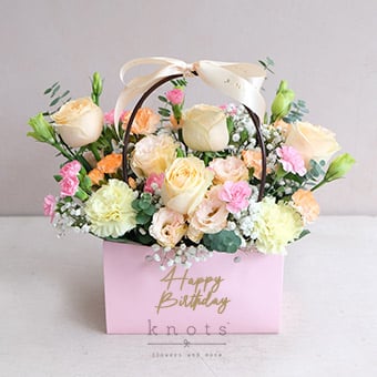 Long Travels and Warm Returns (Peach Roses Arrangement)