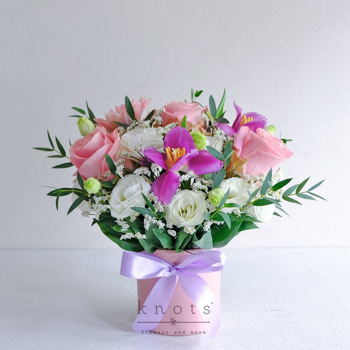 Lavender Haze (Pink Ecuadorian Rose, Purple Tulips, and Pink Gerbera Arrangement) 