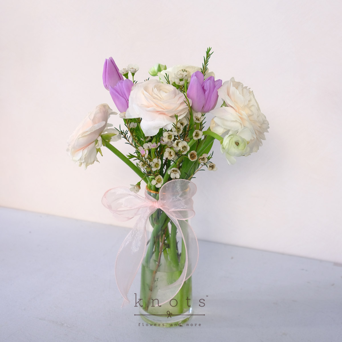 AR2532-Unwavering-Presence-Ranunculus-and-Gerbera-ArrangementA_1200
