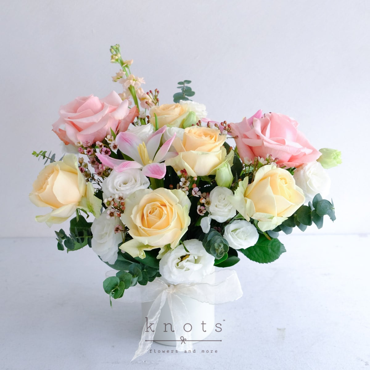 Aurora Bloom (Peach and Pink Roses Arrangement)