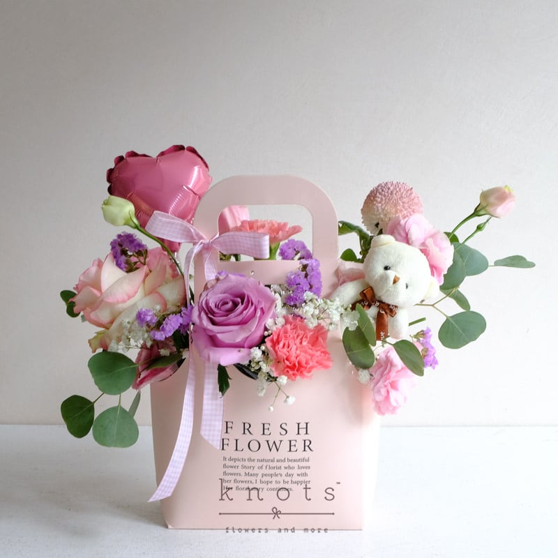 Love's Little Gift (Two-toned Pink and Purple Roses Arrangement)