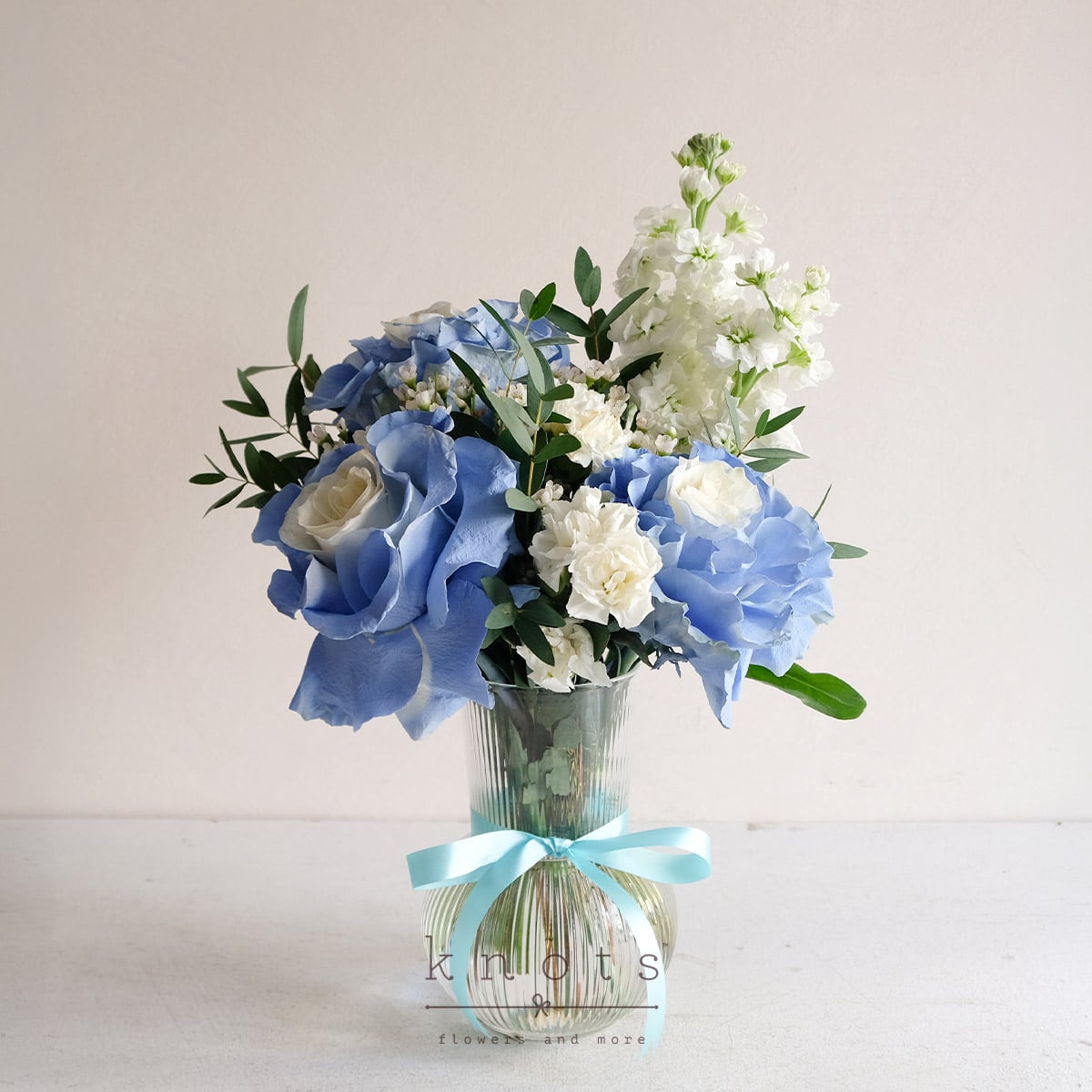 Morning Skies (White Mondial w/ Light Blue Floral Spray Arrangement)