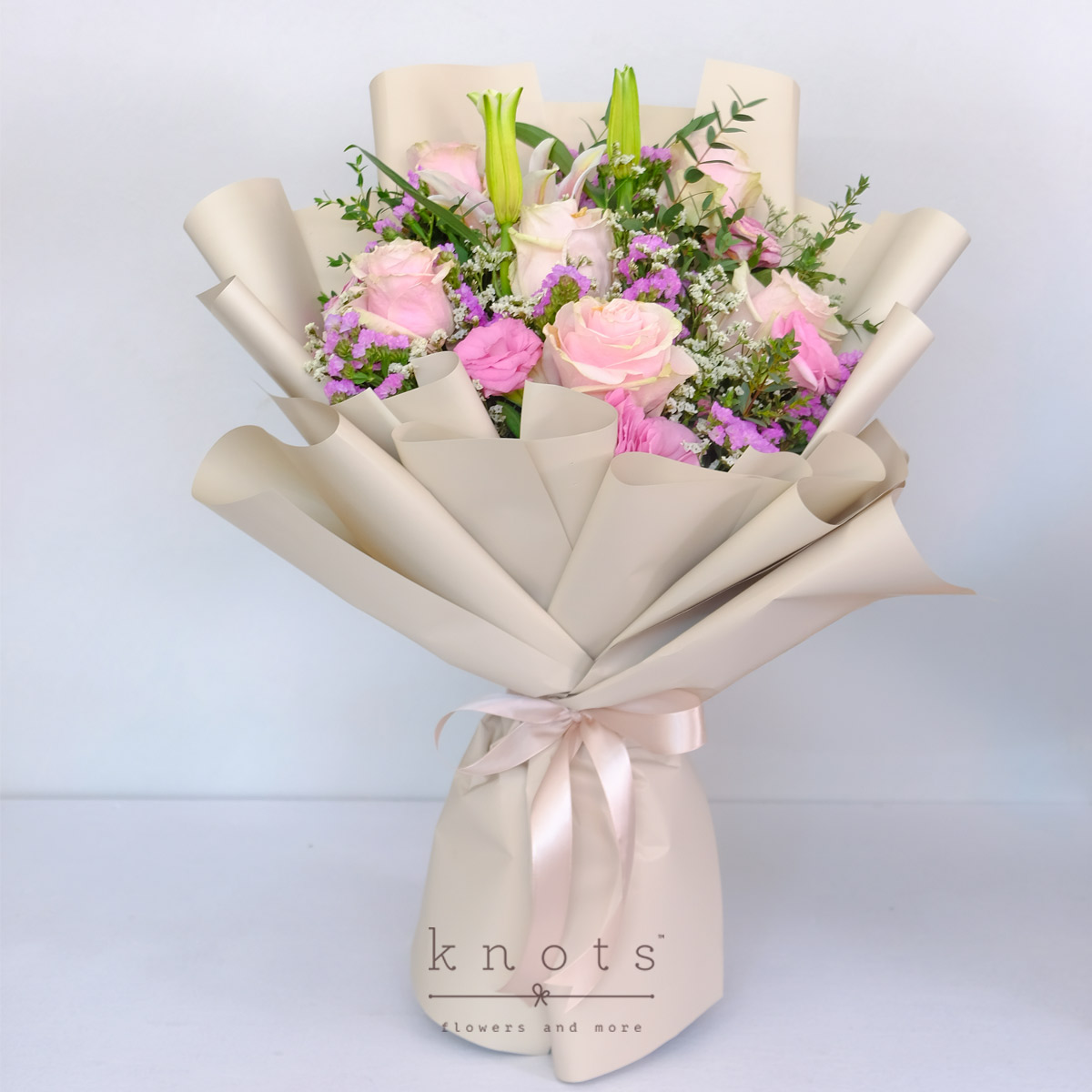 Enchanted Romance (6 Pink Ecuadorian Roses and Pink Lily Bouquet)