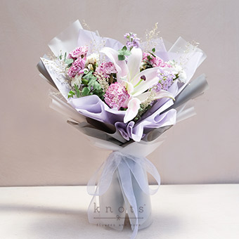 Moonlight Blooms (Lily, and Purple Dyed Carnations Bouquet)
