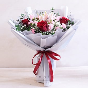 Regal Hearts (Red Ecuadorian Roses& Pink Lily Bouquet)