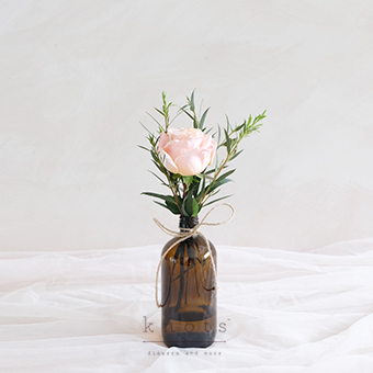 True (Rose in Amber Bottle)