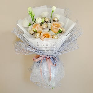 Pristine Touch ( Roses with Ferrero Rocher Chocolates)