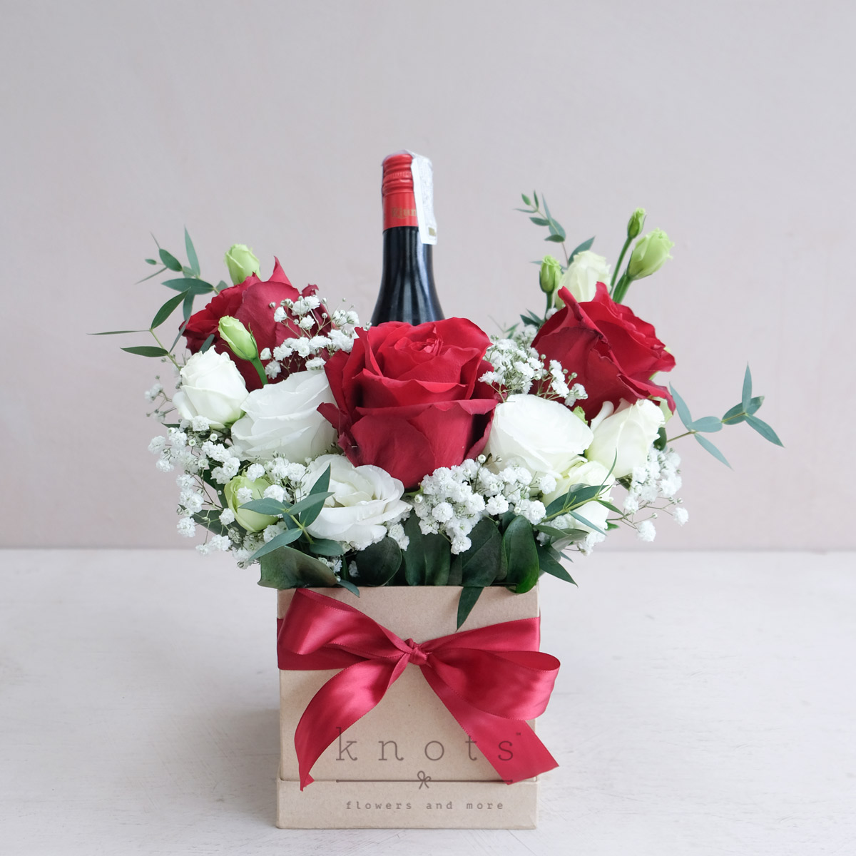 Red at Home (Red Ecuadorian Roses Arrangement w/ Wine)