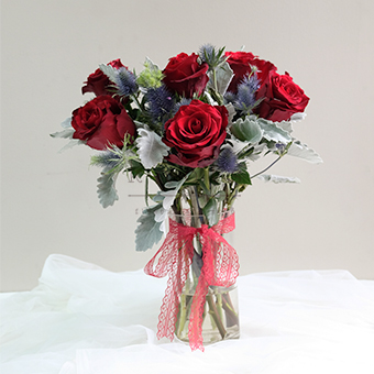  Merry Magnificence (Red Eucadorian Roses Arrangement)