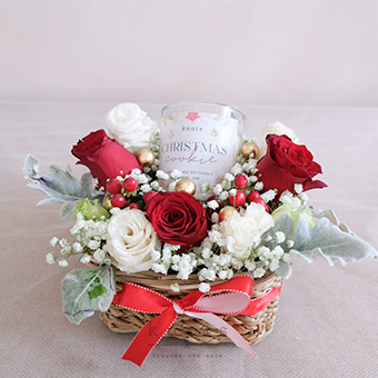 Holiday Glow (Red & White Roses Arrangement with Candle)